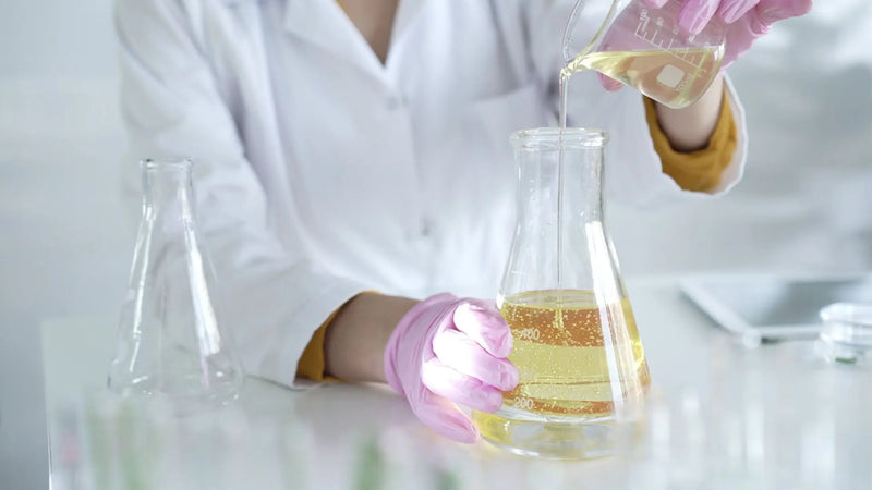 Cosmetic lab testing formulation with glassware and pipette for CPSR assessment and compliant cosmetic labeling
