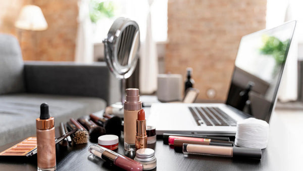 Cosmetic products and laptop for Trading Standards inspection preparation.
