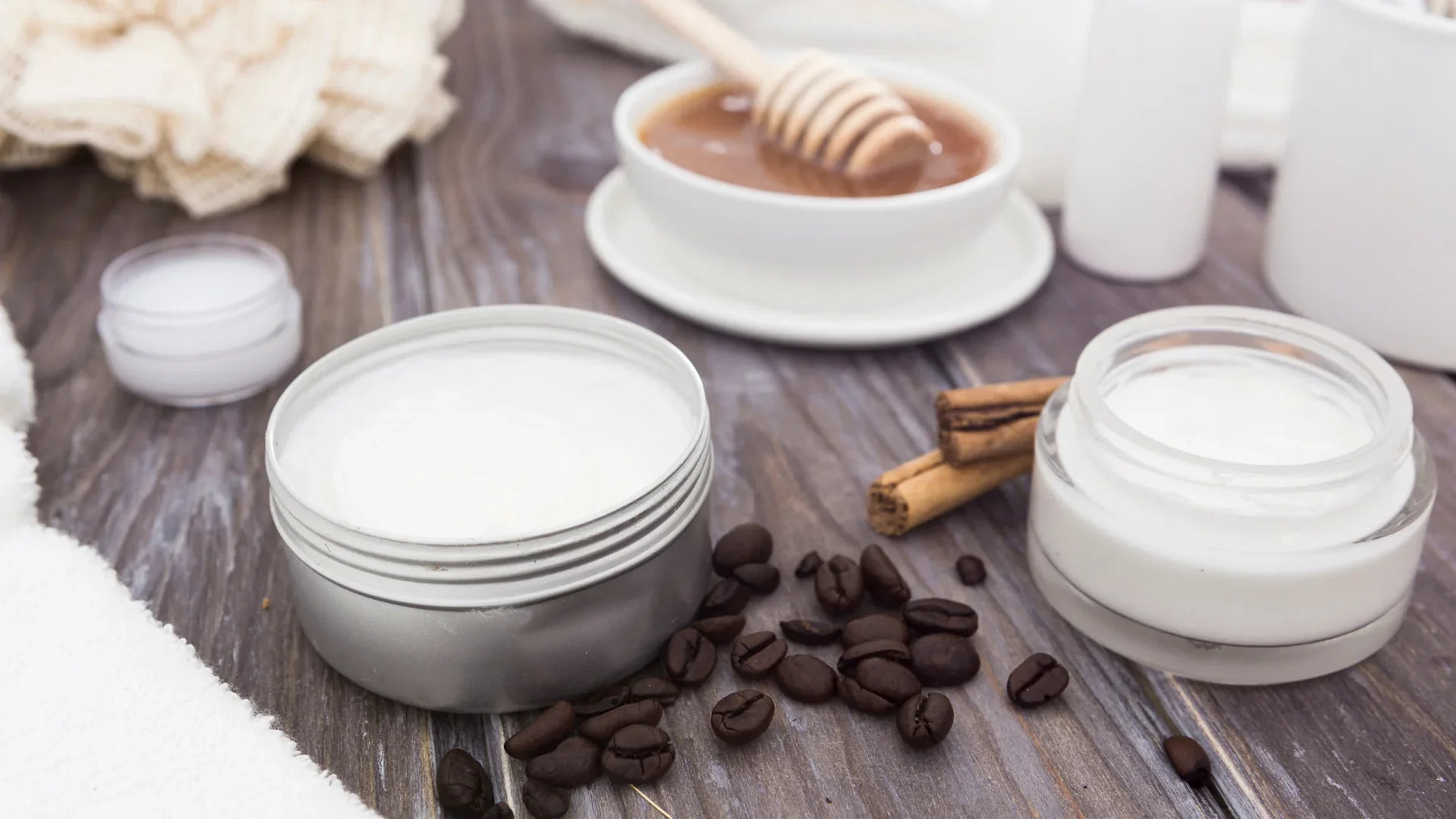 Whipped shea body butter in cosmetic jars for deep skin hydration and nourishment.