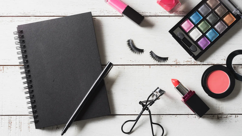 Flat lay of make-up and cosmetic products that need a CPSR before sale in the UK and EU